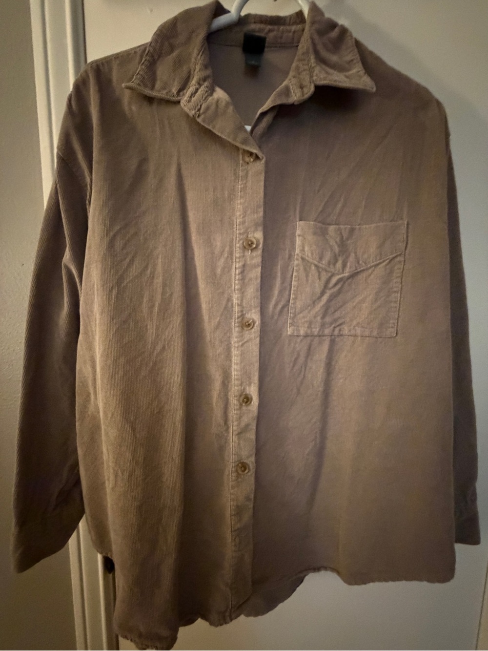 Brown corduroy button-up shirt in a M